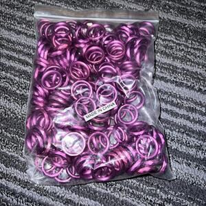 Purple metallic plastic circles for jewelry, crafting and art projects